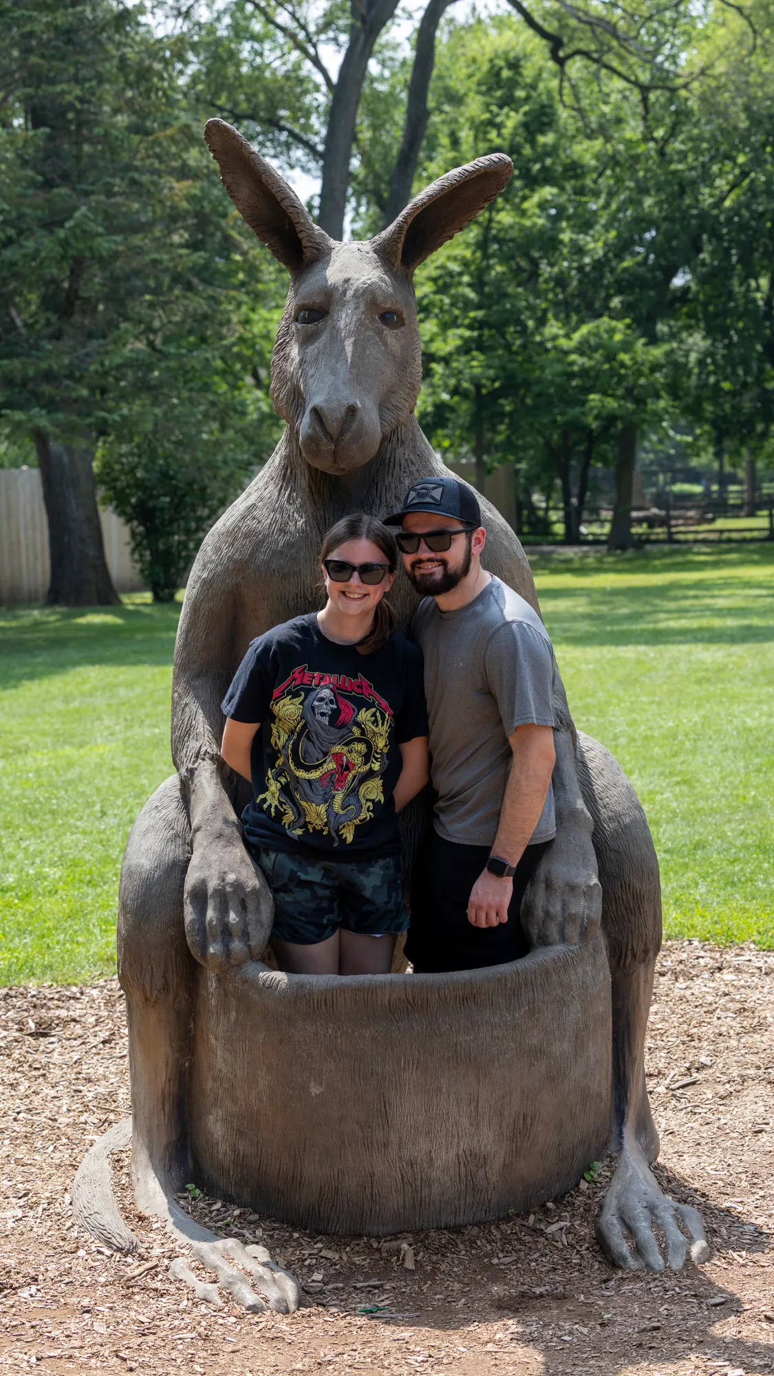 EJ and caitlin pose in the kangaroo statue